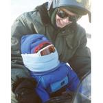 Parents had to prepare their children well for 50-mile snowmobile rides, providing ear and eye protection, warm clothing, and straps to keep them from flying off the machine. Photo of Karen and Sean Andrascik 